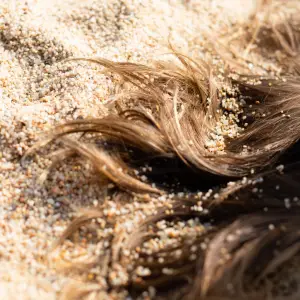 How to get sand out of hair,phone,eyes etc