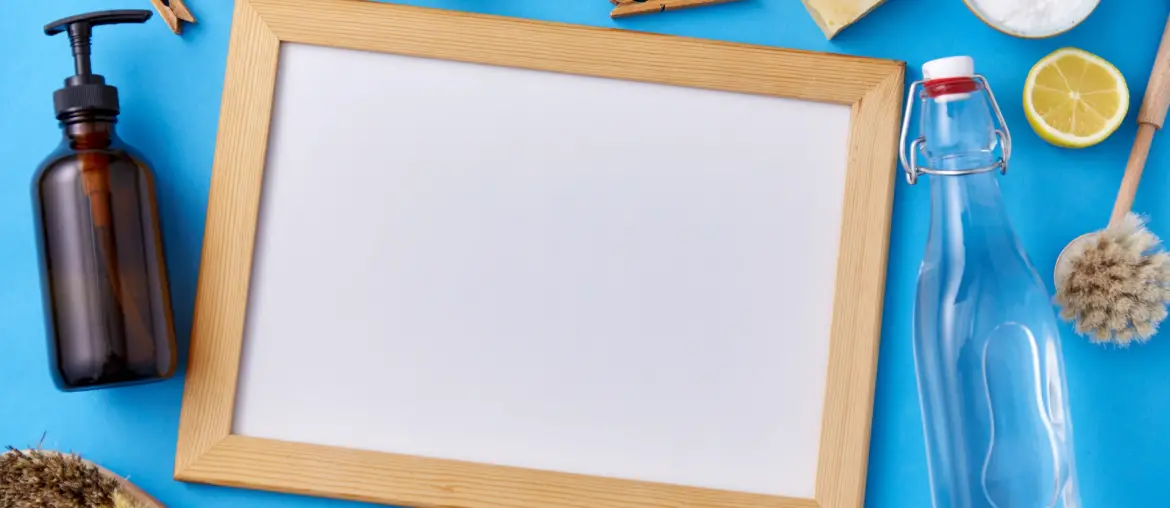 white board with cleaning products around it