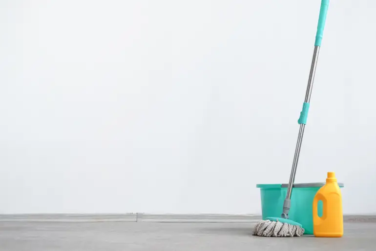 mop, bucket and a bottle