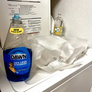 Washing shower curtain liner in a washing machine